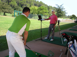 Cours de golf sur le practice 